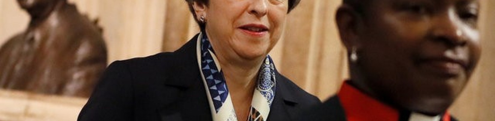 A Bruxelles, May va offrir des garanties pour les Européens outre-Manche